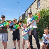 Ready for a summer water fight, residents in Rosegrove taking part in one of the lockdown activities organised by the neighbourhood watch group.