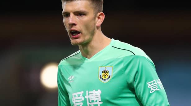 Nick Pope of Burnley looks on during the Premier League match between Burnley and Southampton at Turf Moor on September 26, 2020 in Burnley, England.