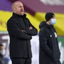 Burnley's English manager Sean Dyche shouts instructions to his players from the touchline during the English Premier League football match between Burnley and Manchester City at Turf Moor in Burnley, north west England on February 3, 2021.