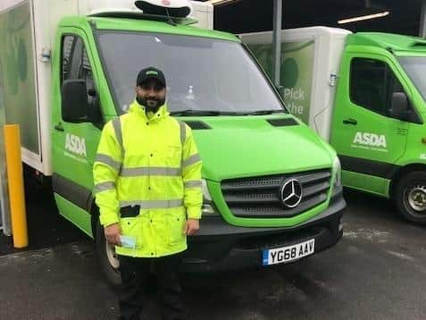 Wajid Hussain, the Asda delivery driver who has been dubbed the 'Milk Tray man' for his valiant efforts to get orders to customers in the snow this week.
