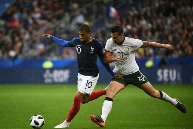 French forward Kylian Mbappe (L) vies Irish defender Kevin Long (R) during the friendly football match between France and Ireland at the Stade de France stadium, in Saint-Denis, on the outskirts of Paris, on May 28, 2018.