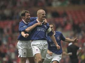 Sean Dyche of Chesterfield receives the congratulations for his goal during the FA Cup Semi-Final against Middlesbrough at Old Trafford in Manchester, England. The game was drawn 3-3.