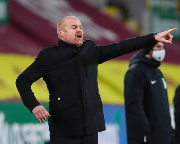 Burnley's English manager Sean Dyche gestures from the touchline during the English Premier League football match between Burnley and Brighton and Hove Albion at Turf Moor in Burnley, north west England on February 6, 2021.