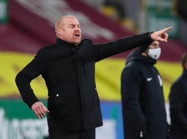 Burnley's English manager Sean Dyche gestures from the touchline during the English Premier League football match between Burnley and Brighton and Hove Albion at Turf Moor in Burnley, north west England on February 6, 2021.
