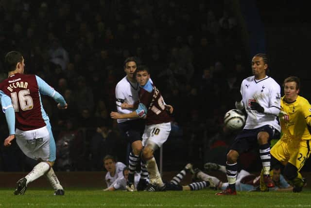 Chris McCann of Burnley scores his team's second goal during the Carling Cup Semi Final 2nd Leg match between Burnley and Tottenham Hotspur at Turf Moor on January 21, 2009 in Burnley, England.