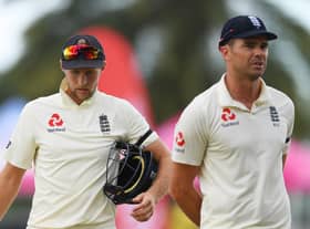 Joe Root and James Anderson of England look dejected in defeat on Day Three of the 2nd Test match between West Indies and England at Sir Vivian Richards Stadium on February 02, 2019 in St John's, Antigua and Barbuda.