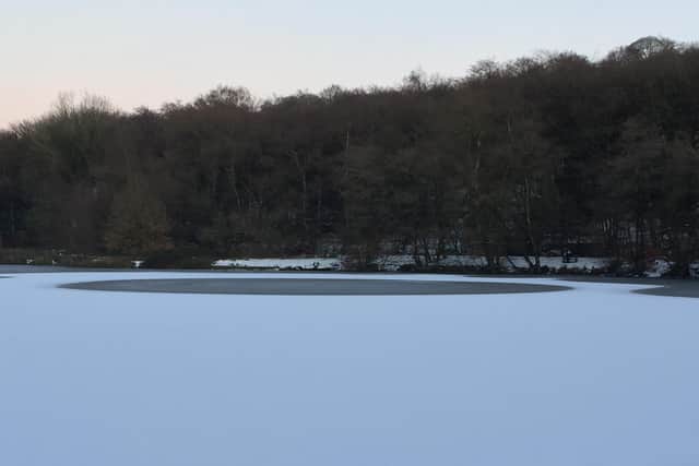 Trust volunteers had to dog walkers of the dangers of thin ice after they were found treading along a frozen lake at Foxhill Bank in Oswaldtwistle