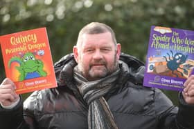 Glenn Beavers with two of his new books