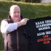 Coun Alan Pearson pictured holding the Orders T-shirt     (photo: Dan Martino)