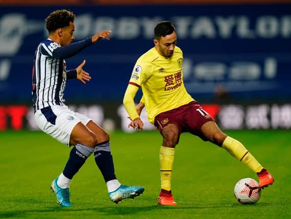 West Bromwich Albion's Brazilian midfielder Matheus Pereira (L) vies with Burnley's English midfielder Dwight McNeil (R) during the English Premier League football match at The Hawthorns stadium in West Bromwich, central England, on October 19, 2020.