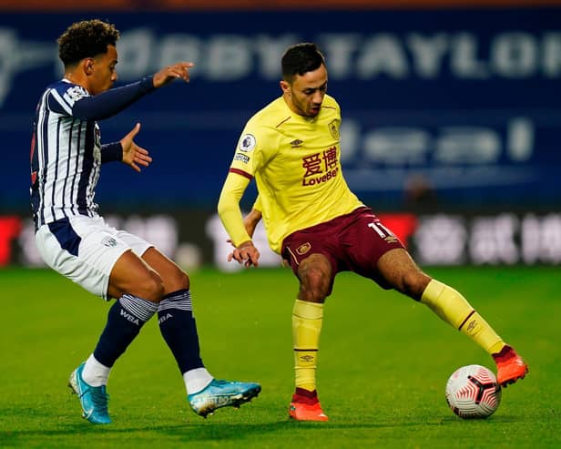 West Bromwich Albion's Brazilian midfielder Matheus Pereira (L) vies with Burnley's English midfielder Dwight McNeil (R) during the English Premier League football match at The Hawthorns stadium in West Bromwich, central England, on October 19, 2020.