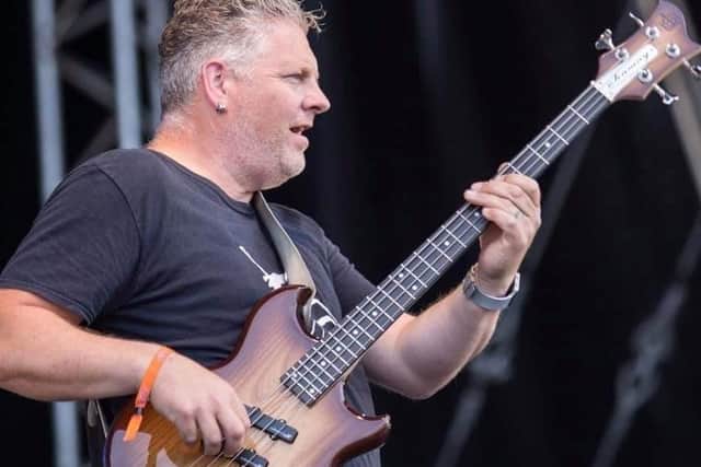 Bass guitarist Scott on stage with Big Country