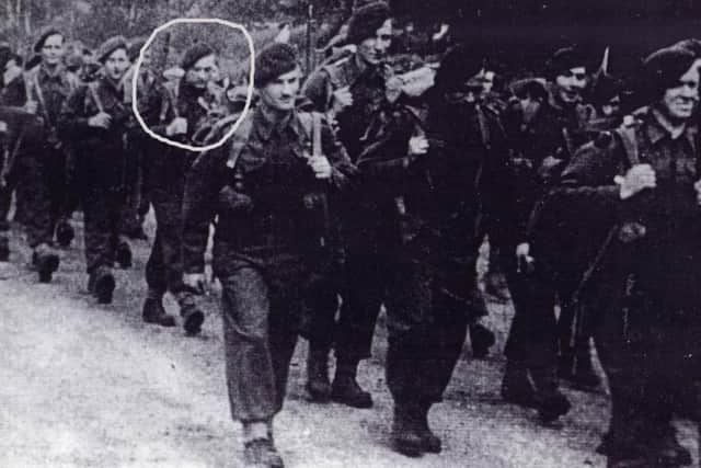 Harvey (circled) with his comrades during the war