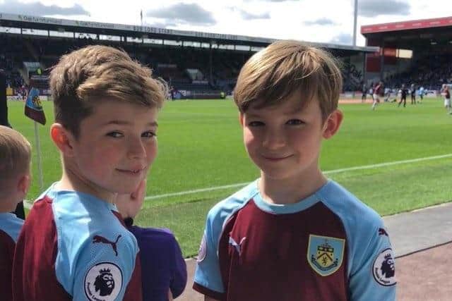 Freddie Xavi (left) ran 100km to raise a fantastic £126,000 for the hospital that is treating his friend Hughie Higginson who has leukaemia and is a student at Helen's Encore Dance School