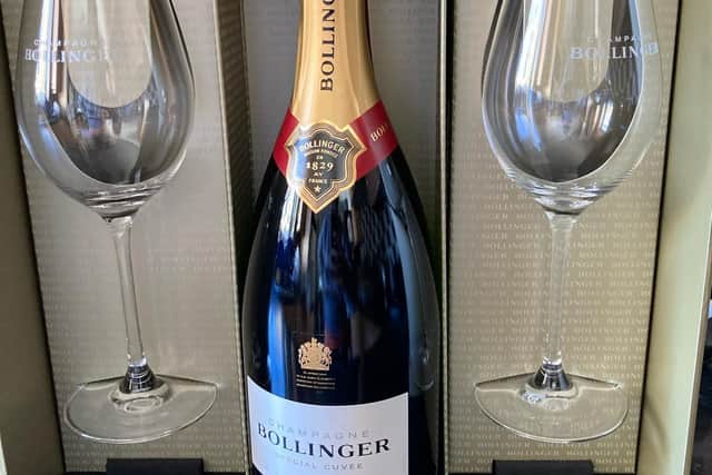 The Bollinger comes gift boxed with two champagne flutes