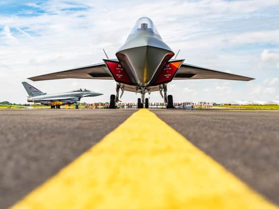 BAE Systems' prototype of Tempest, the next generation of fighter jet, with the Typhoon in the background