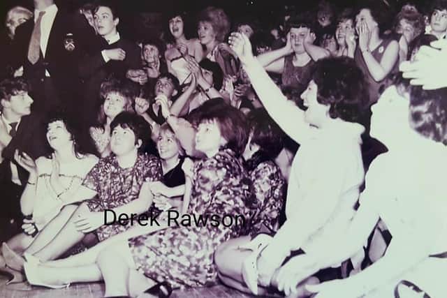 Trevor (left) standing next to the bouncer watching The Beatles at Nelson's Imperial Ballroom