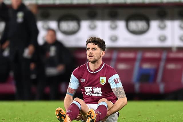 Robbie Brady of Burnley goes down injured during the Premier League match between Burnley and Crystal Palace at Turf Moor on November 23, 2020 in Burnley, England.