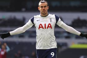 Gareth Bale of Tottenham Hotspur celebrates after scoring their side's first goal during the Premier League match between Tottenham Hotspur and Burnley at Tottenham Hotspur Stadium on February 28, 2021 in London, England.