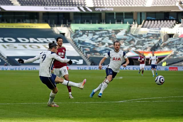 Tottenham Hotspur's Welsh striker Gareth Bale (L) scores his team's fourth goal, his second, during the English Premier League football match between Tottenham Hotspur and Burnley at Tottenham Hotspur Stadium in London, on February 28, 2021.