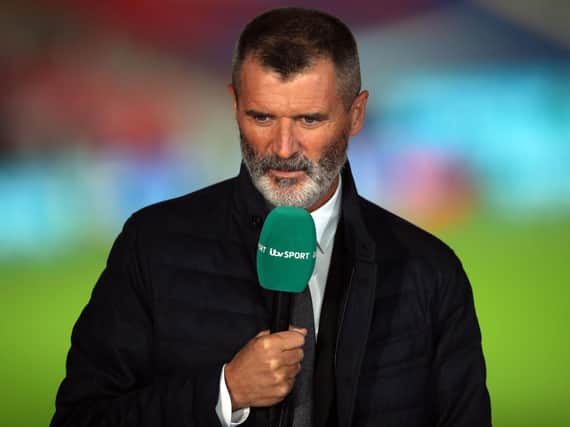 Former Manchester United and Republic of Ireland footballer Roy Keane takes part in a television broadcast during the international friendly football match between England and Wales at Wembley stadium in north London on October 8, 2020.