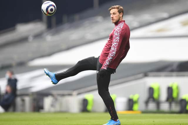 Chris Wood of Burnley warms up prior to the Premier League match between Tottenham Hotspur and Burnley at Tottenham Hotspur Stadium on February 28, 2021 in London, England.