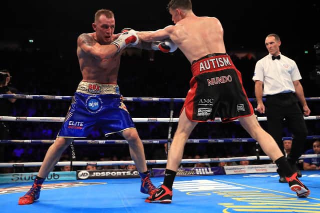 Callum Smith (R) of Liverpool in action against Luke Blackledge of Darwen during their British Super-Middleweight Championship fight at Manchester Arena on December 10, 2016 in Manchester, England.