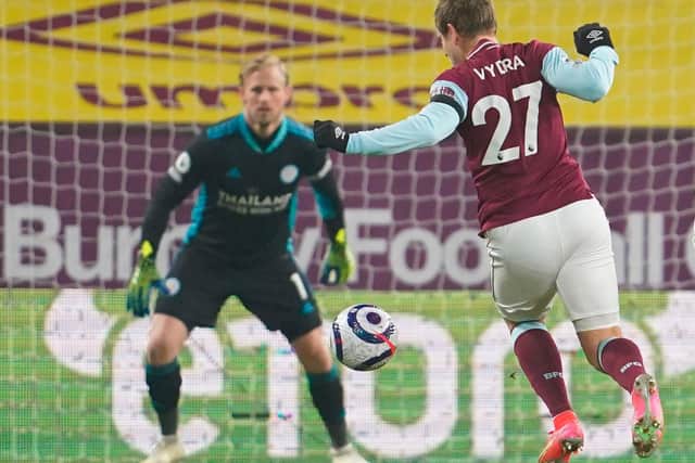 Burnley's Czech striker Matej Vydra (R) breaks through to score the opening goal during the English Premier League football match between Burnley and Leicester City at Turf Moor in Burnley, north west England on March 3, 2021.