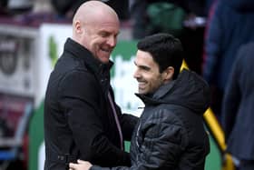 Sean Dyche, Manager of Burnley embraces Mikel Arteta, Manager of Arsenal prior to the Premier League match between Burnley FC and Arsenal FC at Turf Moor on February 02, 2020 in Burnley, United Kingdom.