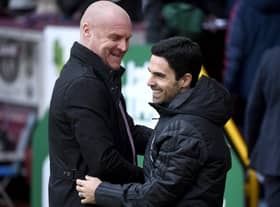 Sean Dyche, Manager of Burnley embraces Mikel Arteta, Manager of Arsenal prior to the Premier League match between Burnley FC and Arsenal FC at Turf Moor on February 02, 2020 in Burnley, United Kingdom.