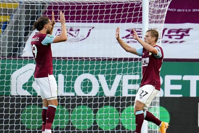 Matej Vydra of Burnley celebrates with Jay Rodriguez after scoring his sides first goal during the Carabao Cup second round match between Burnley and Sheffield United at Turf Moor on September 17, 2020 in Burnley, England.