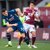 Arsenal's Swiss midfielder Granit Xhaka vies with Burnley's English midfielder Ashley Westwood during the English Premier League football match between Burnley and Arsenal at Turf Moor in Burnley, north west England on March 6, 2021.