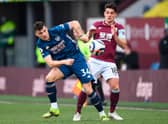 Arsenal's Swiss midfielder Granit Xhaka vies with Burnley's English midfielder Ashley Westwood during the English Premier League football match between Burnley and Arsenal at Turf Moor in Burnley, north west England on March 6, 2021.