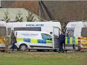 Police vehicles in Ashford in Kent (Gareth Fuller/PA)
