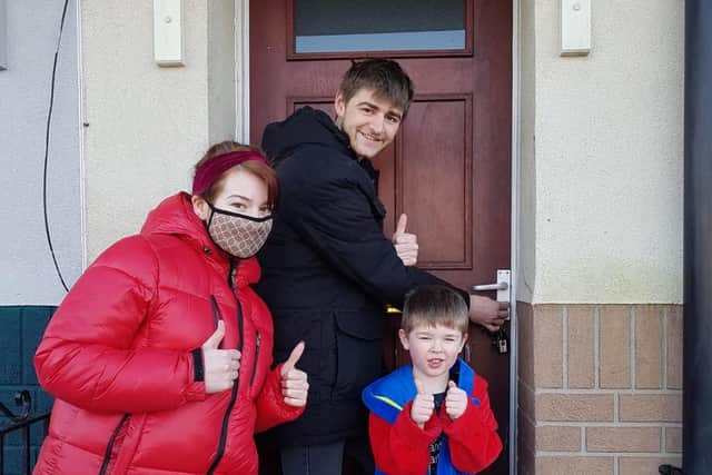 One of the families helped by The Calico Group get ready to move into their new home