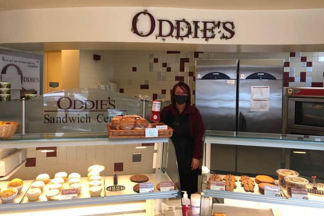 Kelly Davis, counter assistant at Oddie’s in Scotland Road, Nelson, with one of the Rosemere Cancer Foundation collection tins the bakery has had on its counter at all branches to enourage customer support for the charity