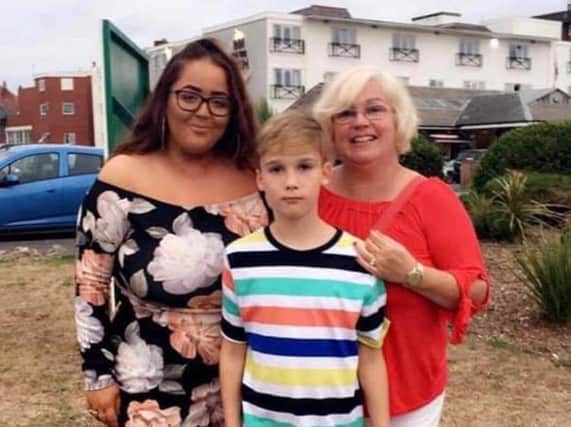 Being a parent is the best job in the world for Sue Plunkett pictured with her daughter Jenny and son Robbie