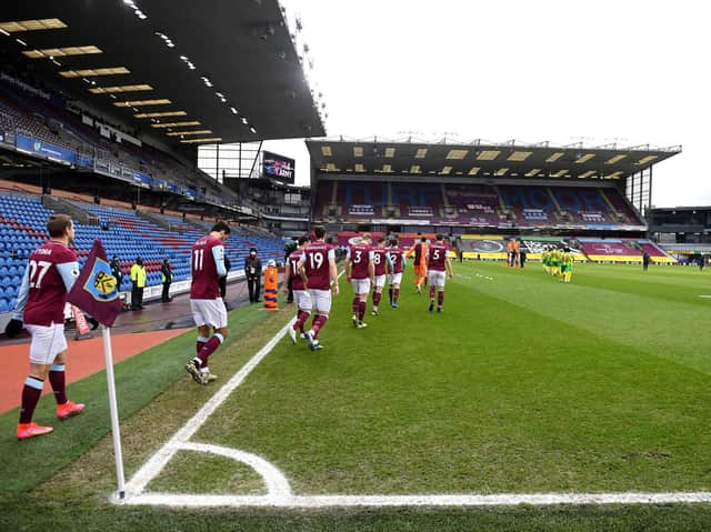 General view inside the stadium as the Burnley players walk out to the pitch prior to the Premier League match between Burnley and West Bromwich Albion at Turf Moor on February 20, 2021 in Burnley, England.