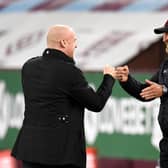 Sean Dyche, Manager of Burnley and Ralph Hasenhuttl, Manager of Southampton interact prior to the Premier League match between Burnley and Southampton at Turf Moor on September 26, 2020 in Burnley, England.