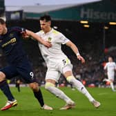 Chris Wood of Burnley battles for possession with Robin Koch of Leeds United during the Premier League match between Leeds United and Burnley at Elland Road on January 02, 2022 in Leeds, England.