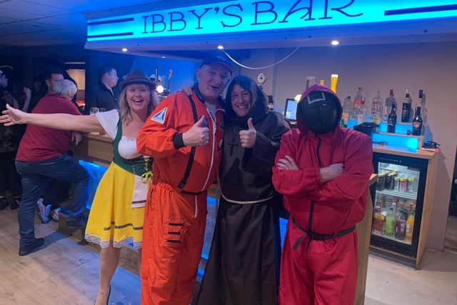 Guests at the Padiham friends' charity fancy dress do get into the spirit of the event