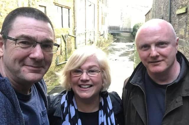 Reporter Sue Plunkett with her former classmates and fellow school reunion organisers Ian Moore (left) and Matthew Sykes