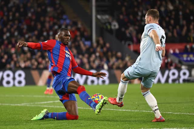 Christian Benteke of Crystal Palace and Vladimir Coufal of West Ham United battle for possession during the Premier League match between Crystal Palace and West Ham United at Selhurst Park on January 01, 2022 in London, England.