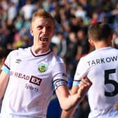 Ben Mee of Burnley celebrates a goal scored by Chris Wood of Burnley (not pictured) which is later disallowed for offside during the Premier League match between Leicester City and Burnley at The King Power Stadium on September 25, 2021 in Leicester, England.