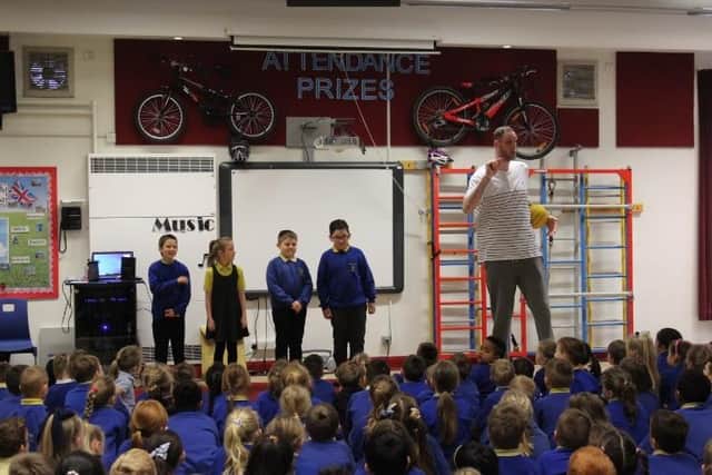 Britain's tallest man, Paul 'Tiny' Sturgess spent the day with students at Burnley's Cherryfold Community Primary School