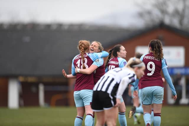 Burnley celebrate a goal against Chorley