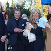 The Duke and Duchess are all smiles as Denise Gee, Charity Manager at ELHT, introduces them to trainee therapy puppy dog ‘Alfie’ while the Trust’s Chaplain, Rev. Canon Andrew Horsfall, looks on. Photo credit: ELHT
