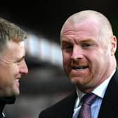 Eddie Howe, then Manager of AFC Bournemouth talks to Sean Dyche, Manager of Burnley prior to the Premier League match between AFC Bournemouth and Burnley FC at Vitality Stadium on December 21, 2019 in Bournemouth, United Kingdom.