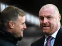 Eddie Howe, then Manager of AFC Bournemouth talks to Sean Dyche, Manager of Burnley prior to the Premier League match between AFC Bournemouth and Burnley FC at Vitality Stadium on December 21, 2019 in Bournemouth, United Kingdom.