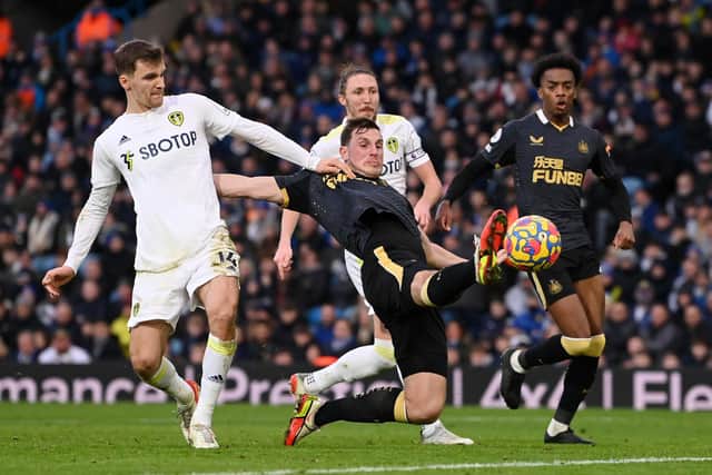 Chris Wood of Newcastle United shoots but fails to score during the Premier League match between Leeds United and Newcastle United at Elland Road on January 22, 2022 in Leeds, England.